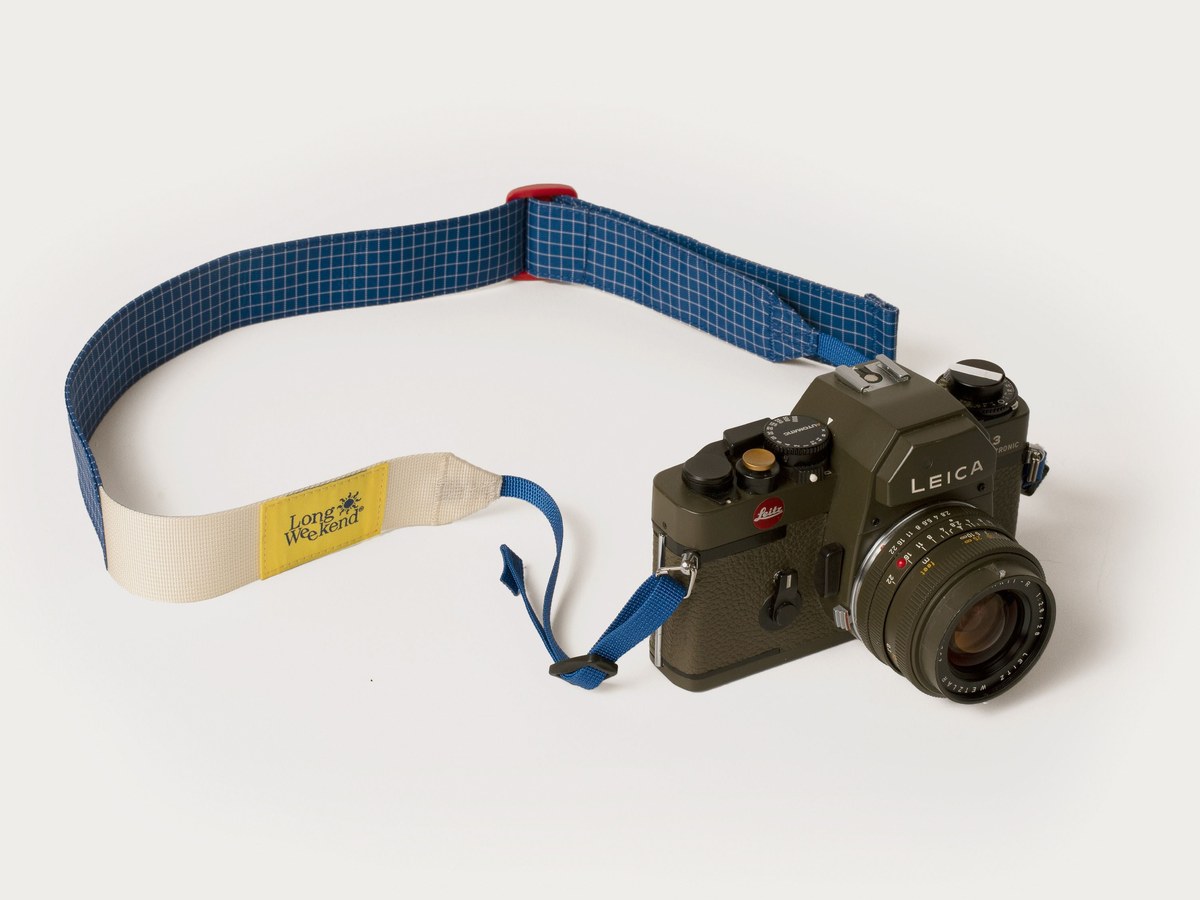 Camera on a Long Weekend strap worn crossbody