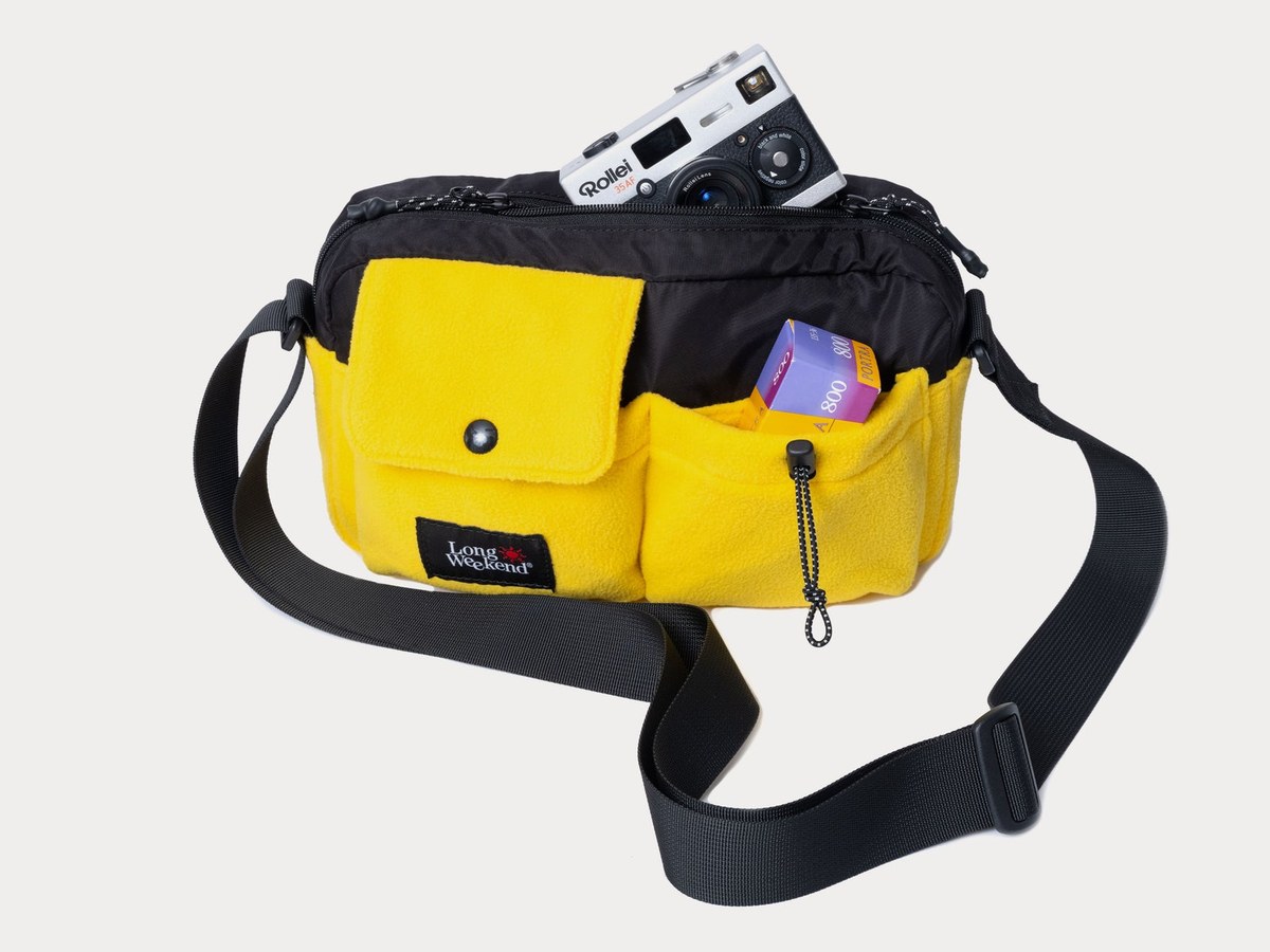 Santa Fe Shoulder Bag Yellow Fleece with a camera and film