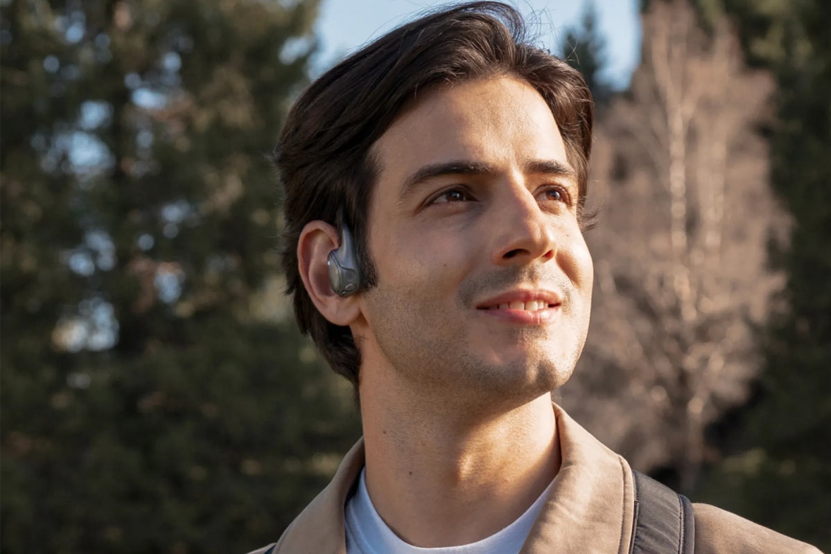 Insta360 POV Head Tracker worn on the ear during POV shooting